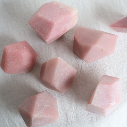 Natural Pink Opal crystal with soft blush pink colouring, milky tones and unique natural variations and markings.
