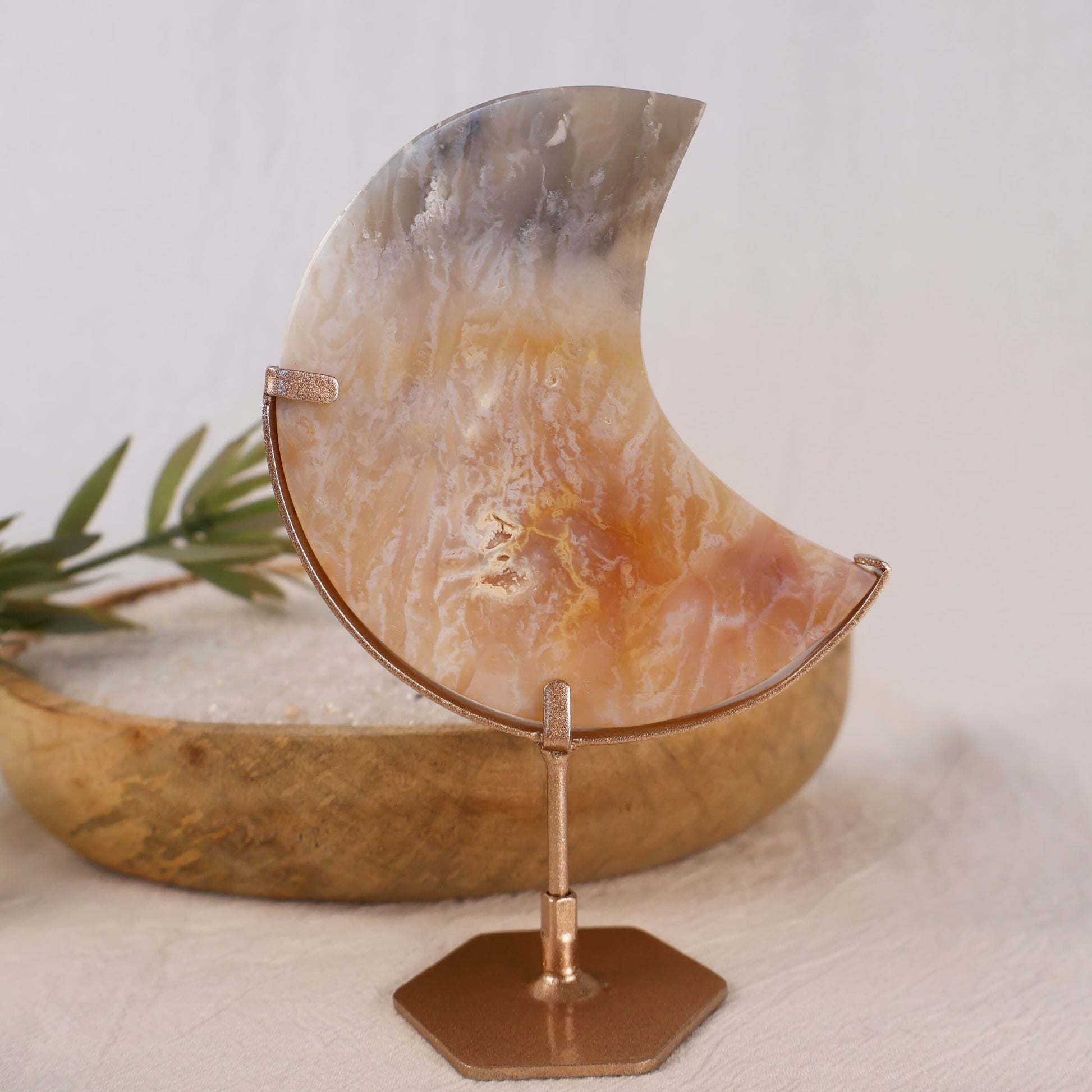 pink plume agate moon on gold stand natural crystal