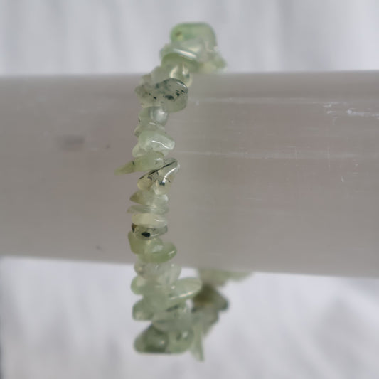 Prehnite chip stretch bracelet with natural soft green crystal chips and subtle variations in colour and translucency.