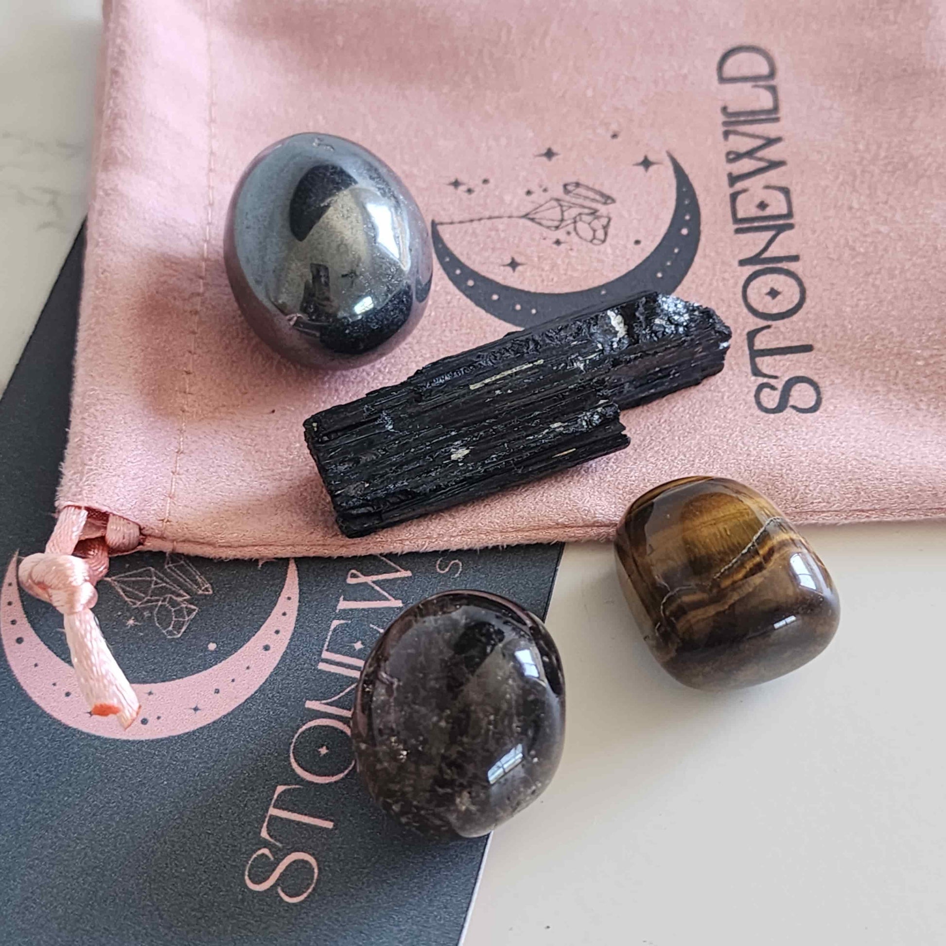 protection and energy shield tumble crystal set with black tourmaline smoky quartz hematite and tigers eye