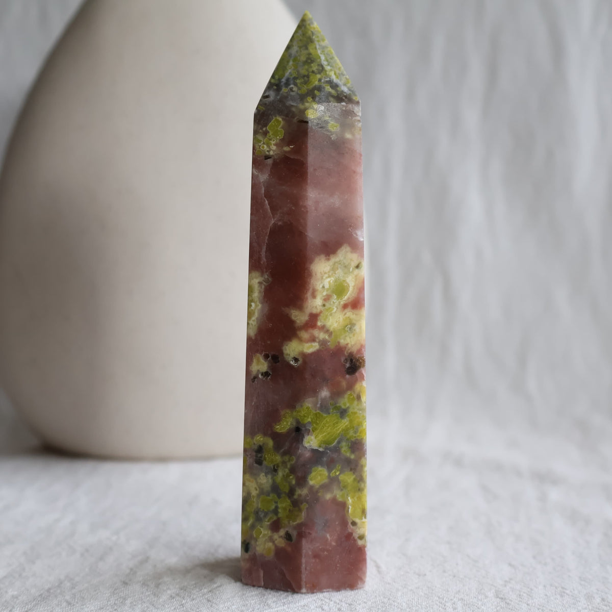 Red Aventurine with Serpentine crystal tower, 12.5cm tall, with natural pink-red and green mineral patterning.