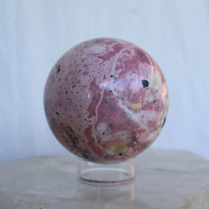 bubblegum pink peruvian rhodonite large sphere natural crystal