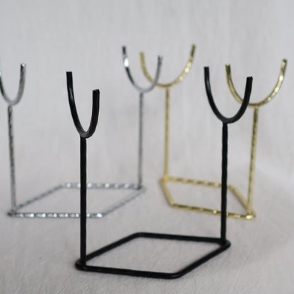 Metal crystal rod and wand display stand available in black, silver and gold, measuring 9.5cm x 10cm.