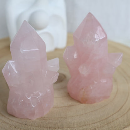 Rose Quartz crystal cluster carving in soft natural pink tones, approximately 8cm tall with multiple carved crystal points.