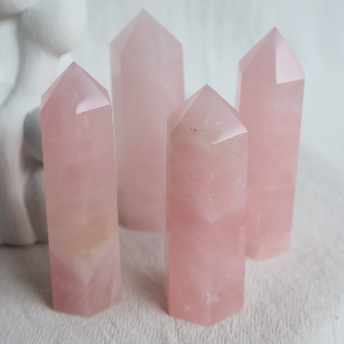 Rose Quartz six-sided crystal generator with soft natural pink colouring and unique variations in clarity and inclusions.