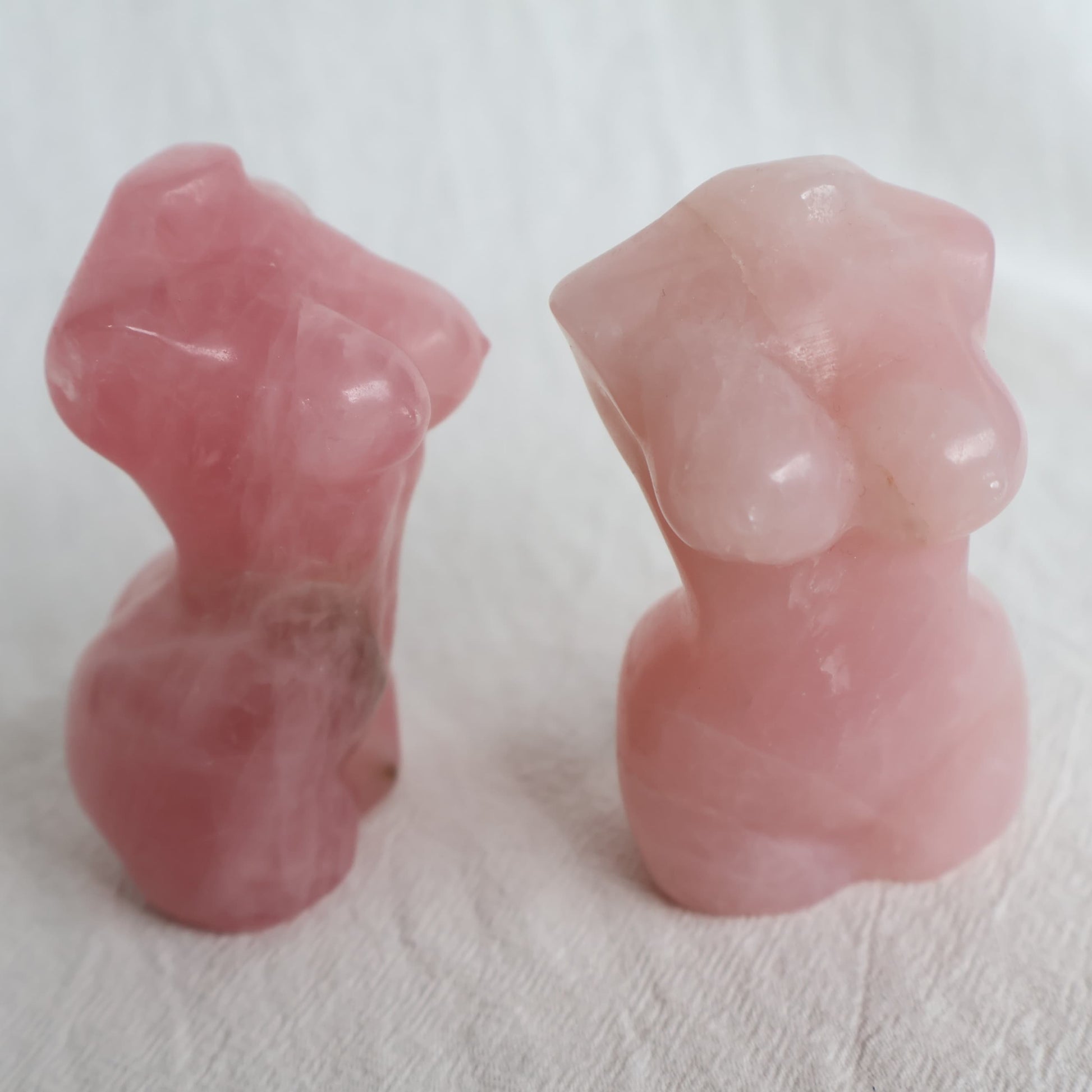 Rose Quartz Goddess carving in soft natural pink tones with unique veils and inclusions, approximately 8cm tall.