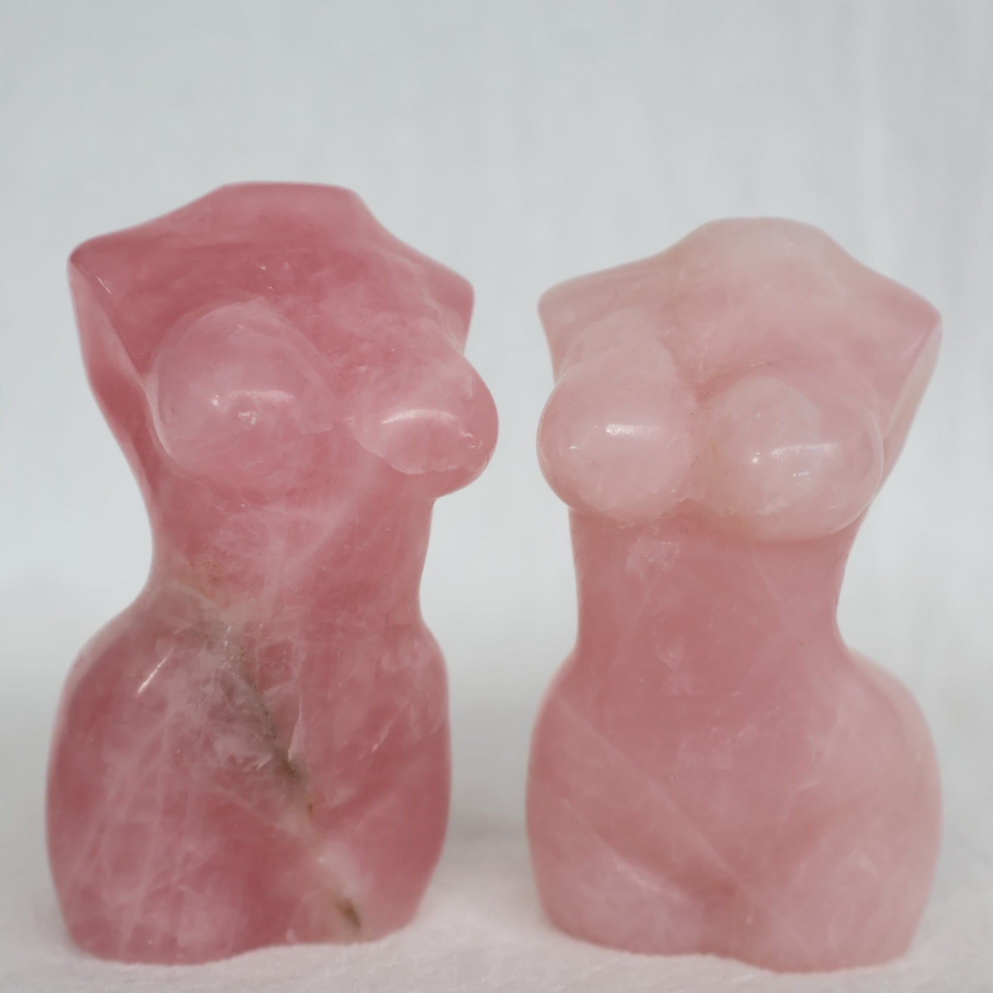 Rose Quartz Goddess carving in soft natural pink tones with unique veils and inclusions, approximately 8cm tall.