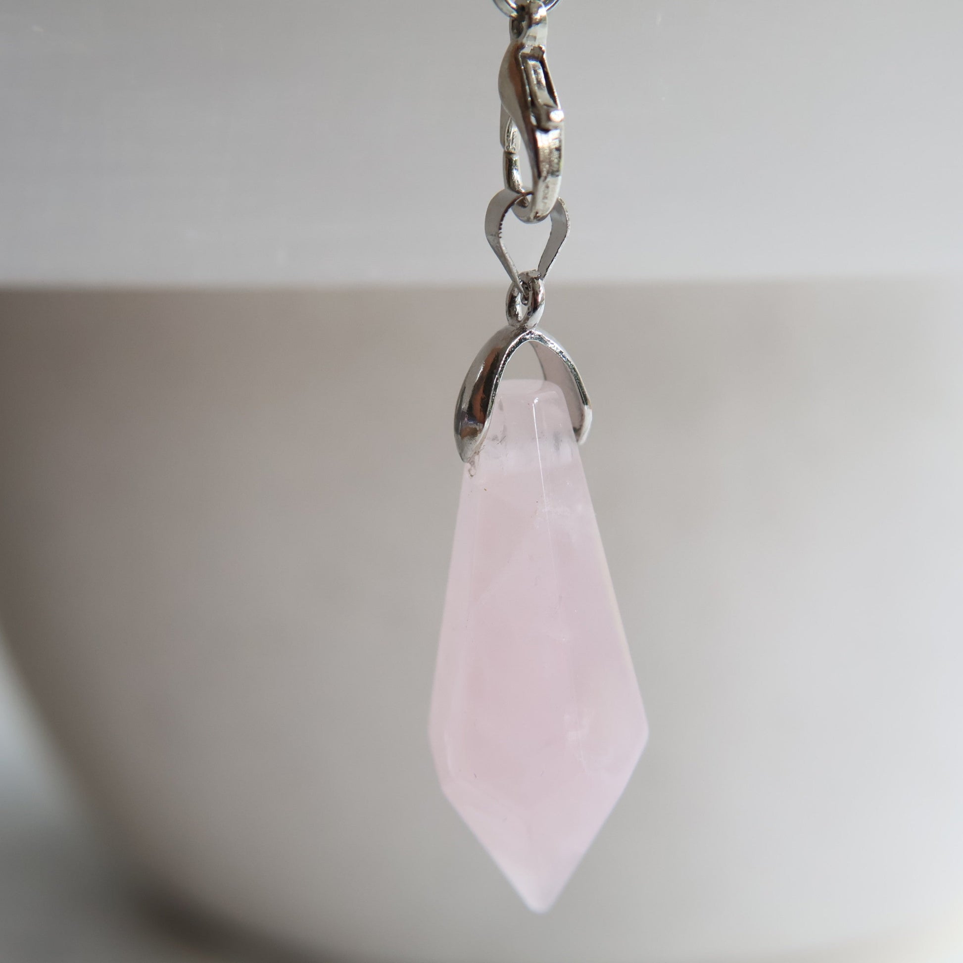 Crystal pendulum intuitively chosen from Labradorite, Rose Quartz, or Amethyst. A simple tool for intuition, reflection, and energy work