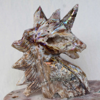 Aura coated sphalerite unicorn carving iridescent crystal – Stonewild