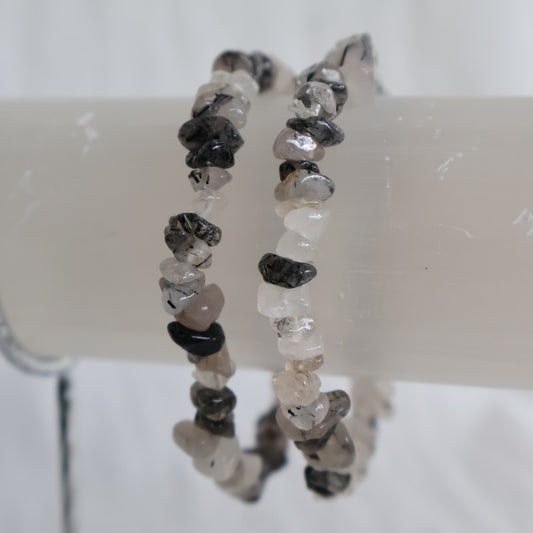 Tourmalinated Quartz chip stretch bracelet with clear to milky Quartz and natural Black Tourmaline needle inclusions.