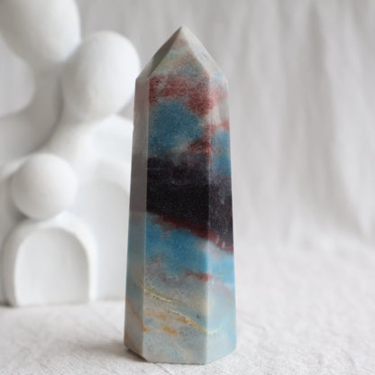 Trolleite crystal towers with vivid blue, burgundy red and cream mineral patterning, polished into generator tower points