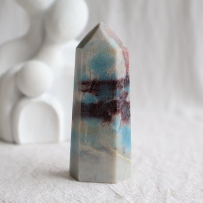 Trolleite crystal towers with vivid blue, burgundy red and cream mineral patterning, polished into generator tower points
