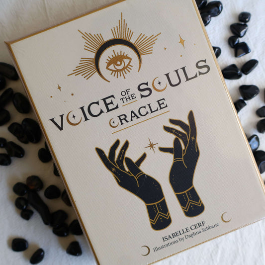 Voice of the Souls Oracle card deck by Isabelle Cerf with elegant black and gold artwork on a cream box and accompanying guidebook.