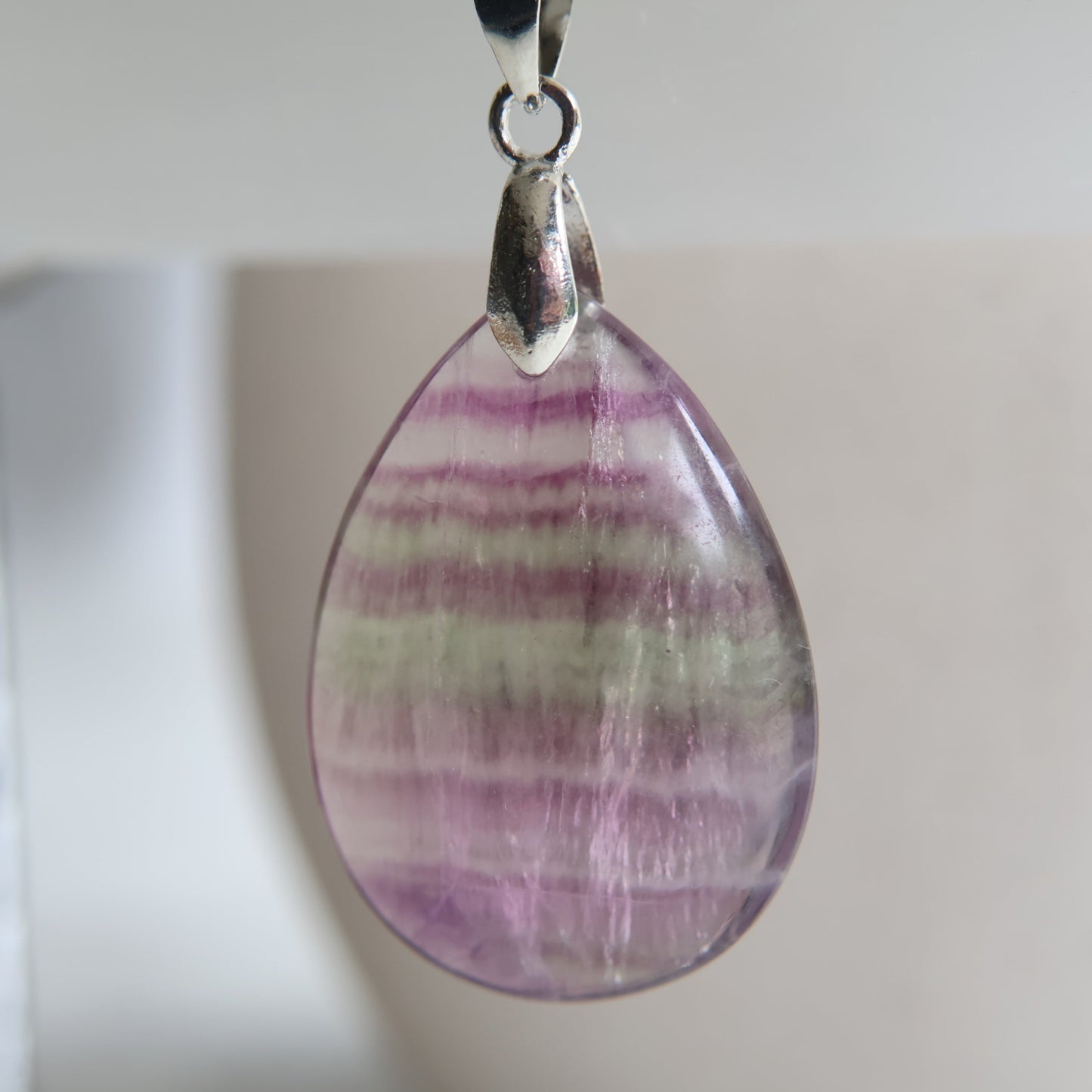 Watermelon fluorite crystal pendant with natural green and purple banding, exact piece shown, 3cm pendant presented by Stonewild
