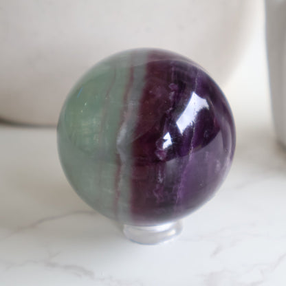 watermelon fluorite crystal sphere for calm and clarity